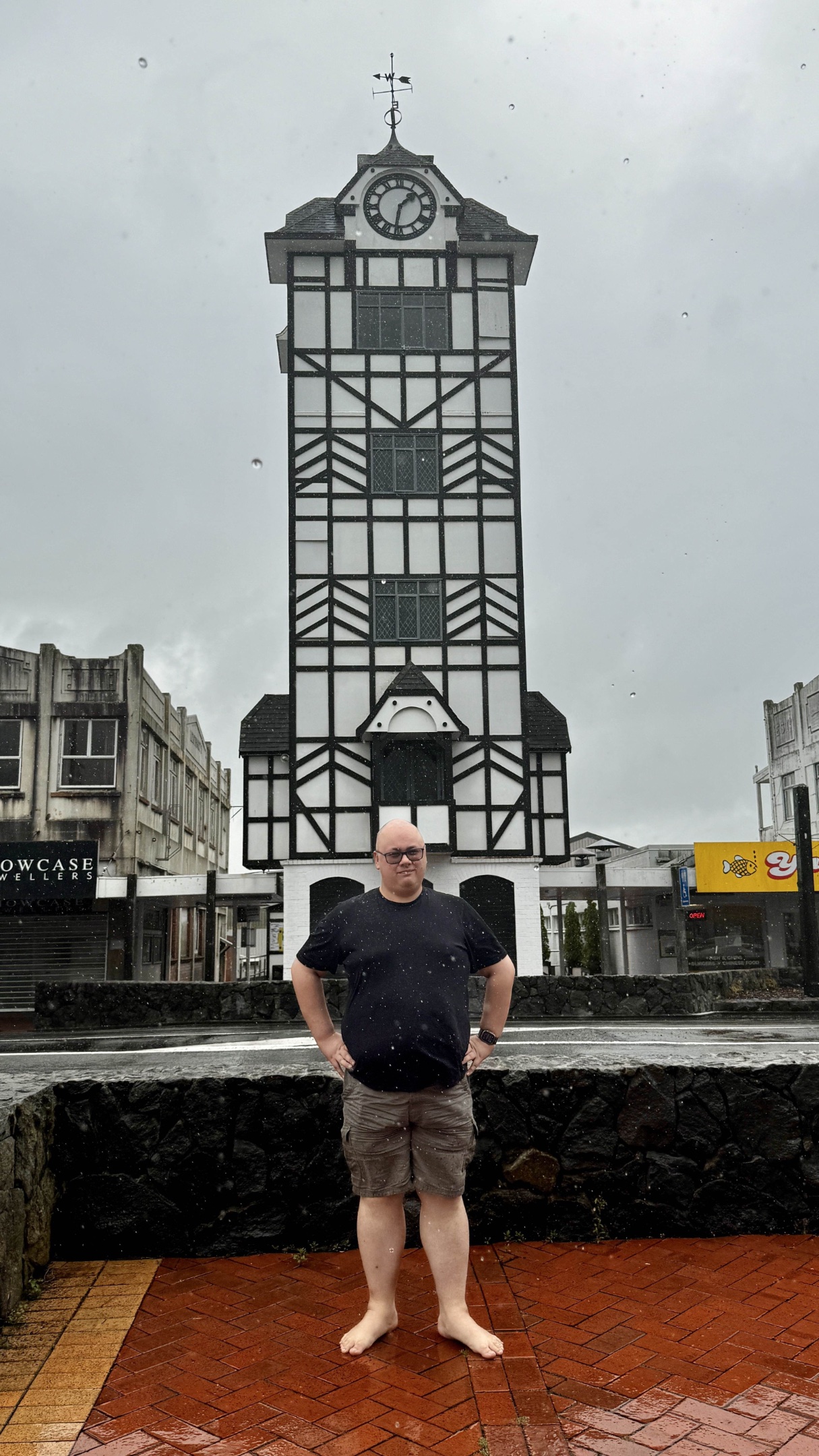 Feets standing in front of the clock tower in Stratford, taken on the way to New Plymouth. The lens was covered in rain drops.